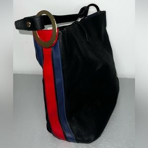 Black handbag with red and blue line